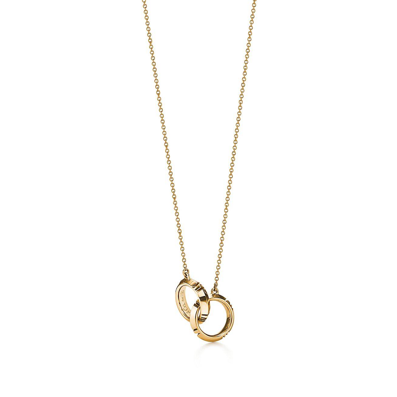 TIFFANY&CO.ATLAS® X CLOSED INTERLOCKING PENDANT IN YELLOW GOLD 67789202